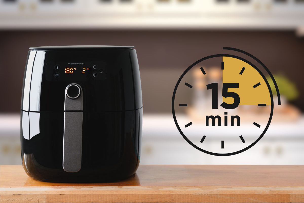 Friggitrice ad aria nera e simbolo cronometro "15 minuti"